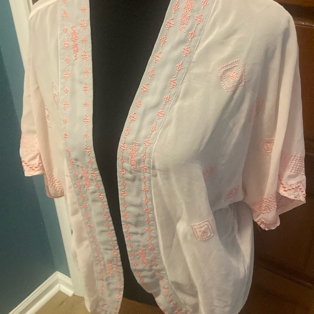Sheer light pink top. Size M
